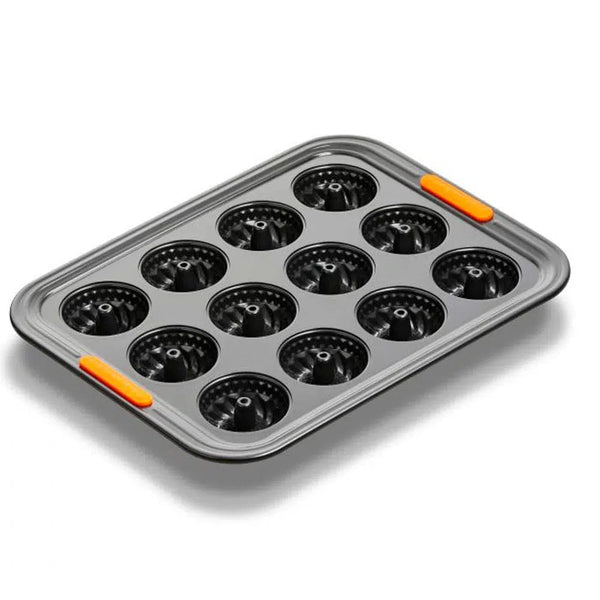 Forma para 12 Mini Bundts Metal Bakeware Le Creuset