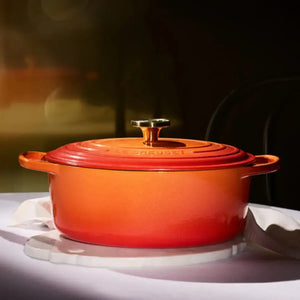 Panela Le Creuset Oval Signature Flamme Dorée com Pegador Dourado 6,3L 31cm