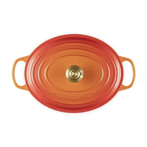 Panela Le Creuset Oval Signature Flamme Dorée com Pegador Dourado 6,3L 31cm