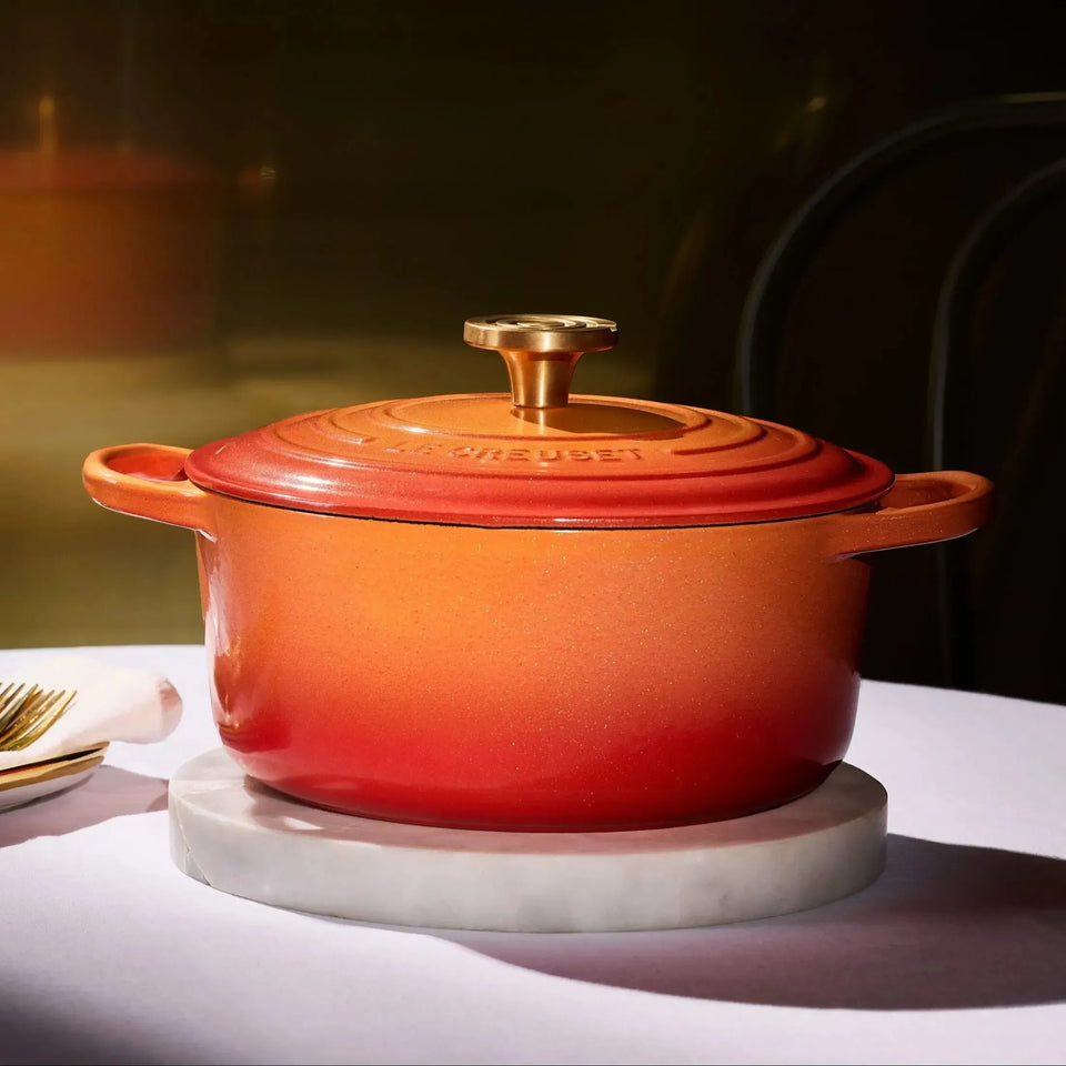 Panela Le Creuset Redonda Signature Flamme Dorée com Pegador Dourado 4,2L 24cm